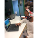 Girl at computer in classroom