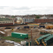 Trucks line up as construction begins