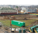 Piles of dirt line the construction site