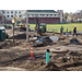 Construction workers installing drainage