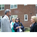 Man speaking to two women