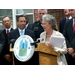 older woman speaking at the podium