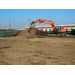excavator begins digging