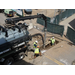 Construction workers using a pump truck