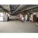 Building materials being stored in the parking garage