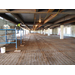 A worker prepares to pour a concrete floor