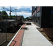 Concrete sidewalk with brick edging