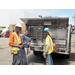 three construction workers smiling