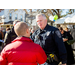 police officer talking to civilian